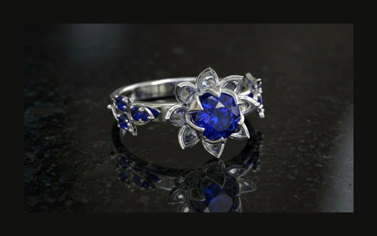 Custom 3D CAD floral cluster ring with blue sapphire center and diamond petal setting — Arvion Designs